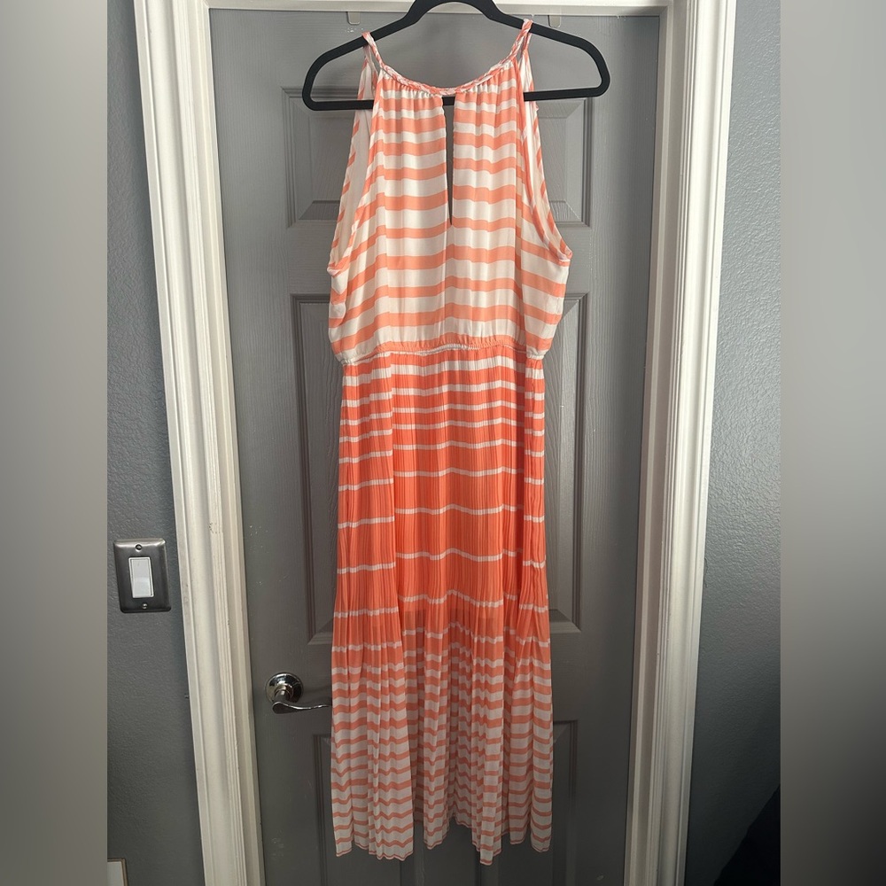 Midi pleated dress with tie back neck.